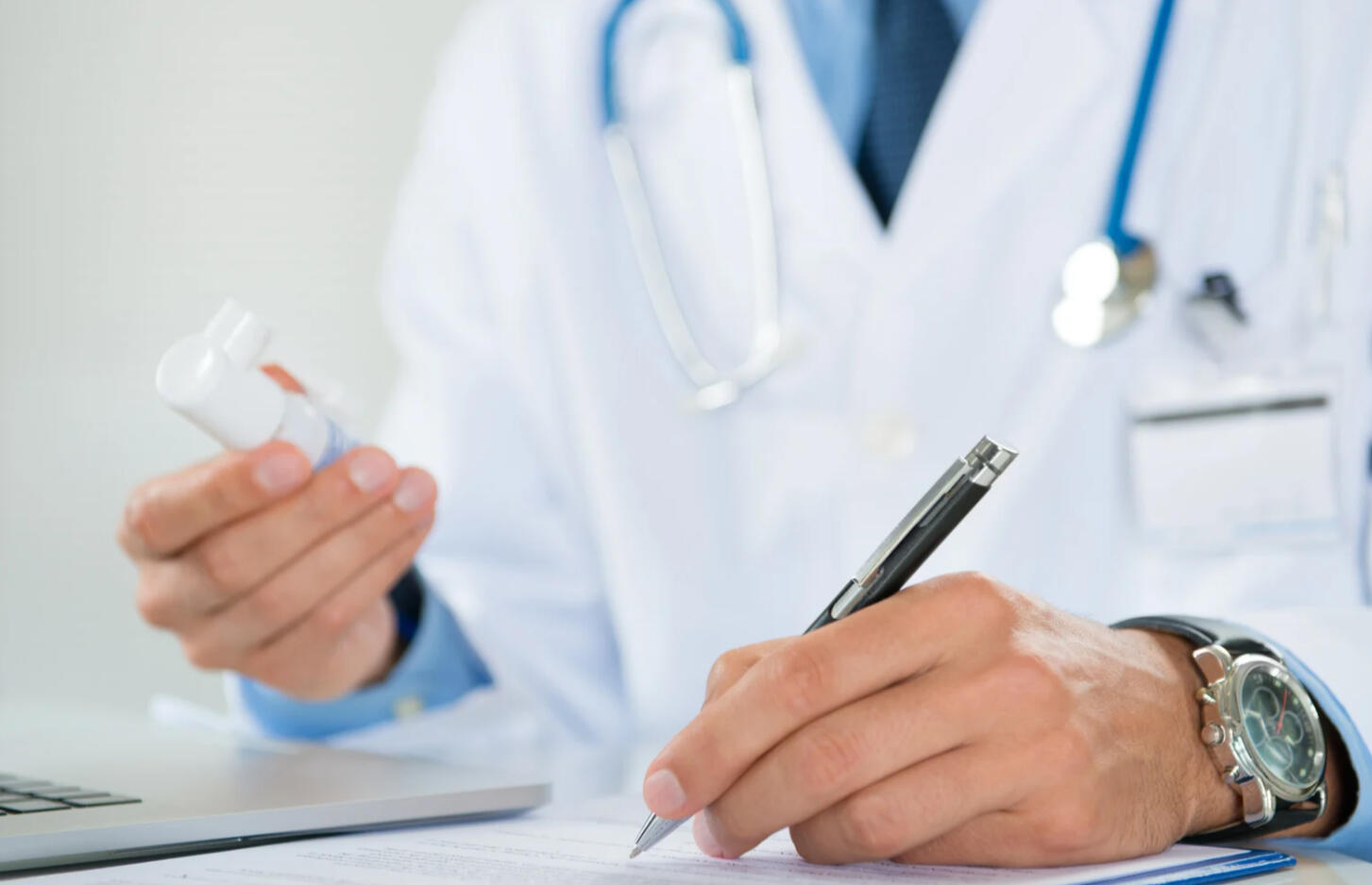 Pharmacist consulting patient
