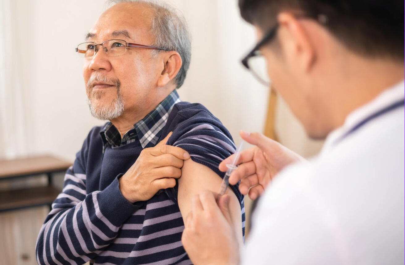 Injecting vaccine into a needle