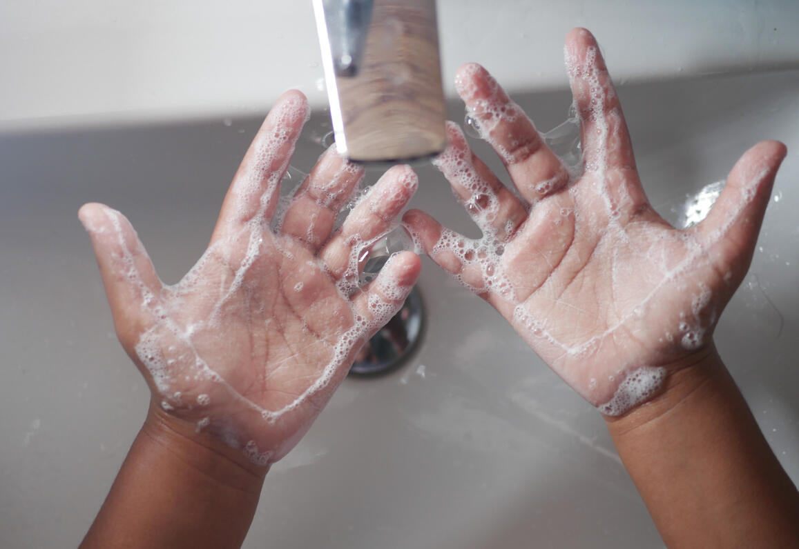 Washing hands in a sink