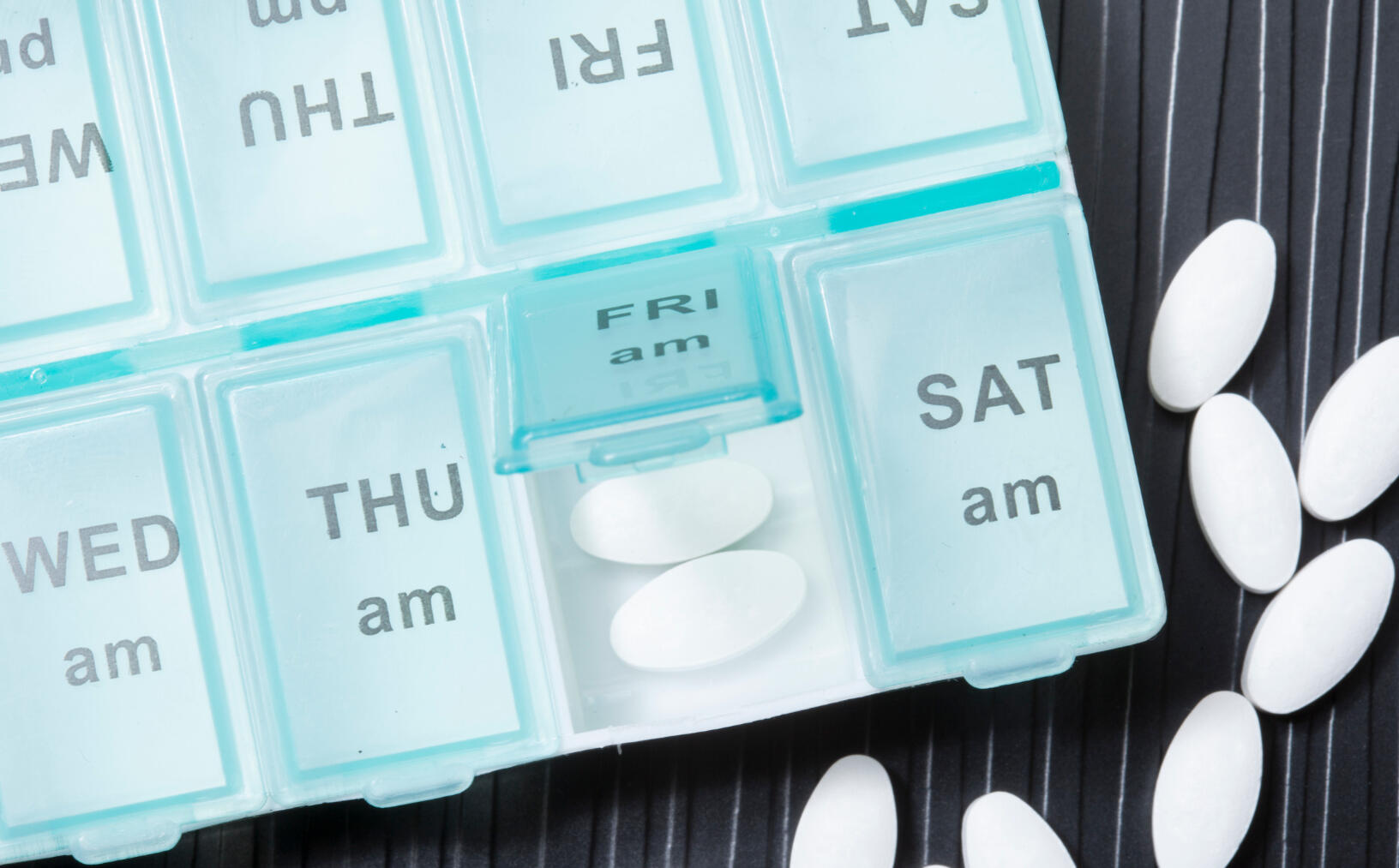 Pills in a white background